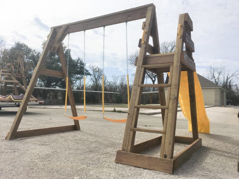 yellow swing and slide set