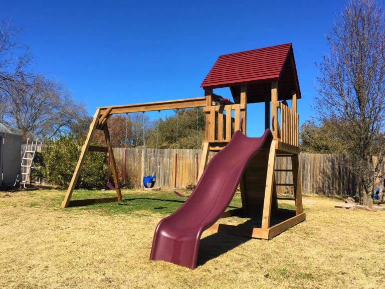 red backyard wooden playset