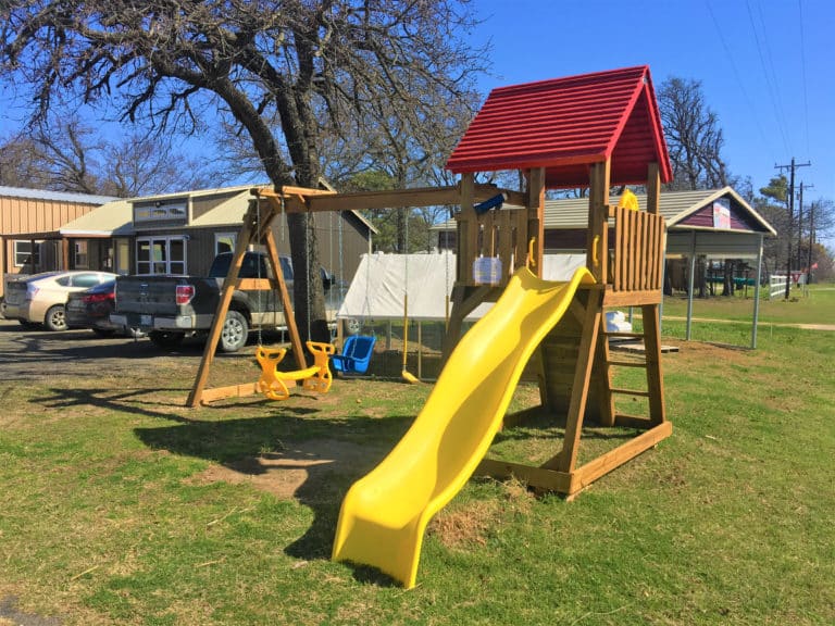 yellow backyard wooden play set